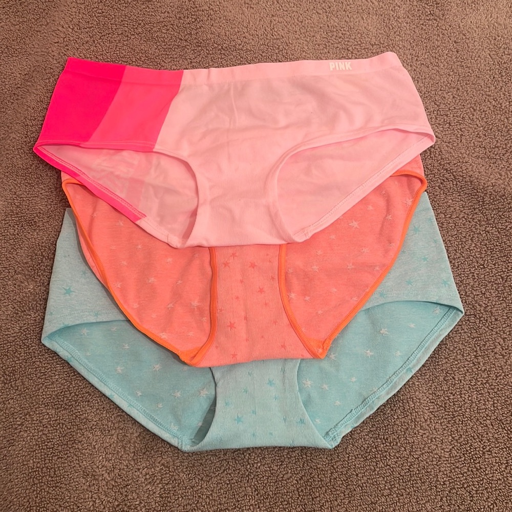 Pink bundle of 3 underwear. Pink, coral, and blue